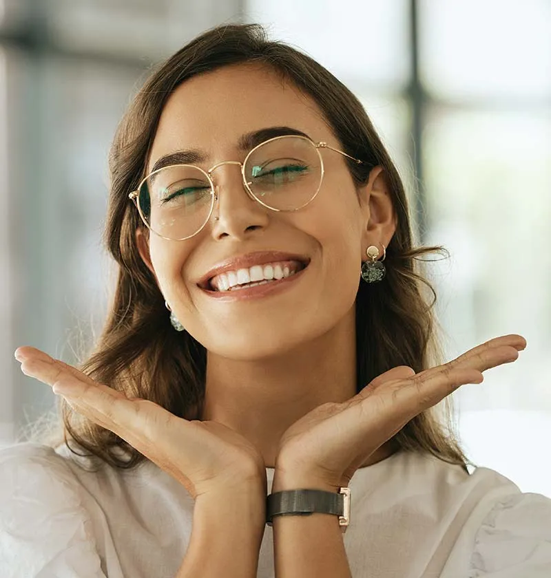 Woman in glasses smiling