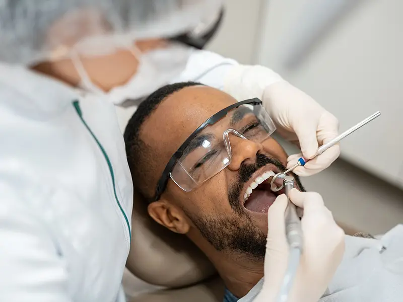 African American male getting dental work